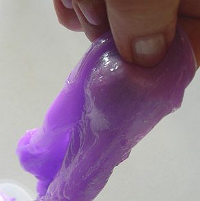 Purple slime in a hand