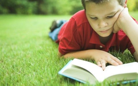 photo of a kid reading